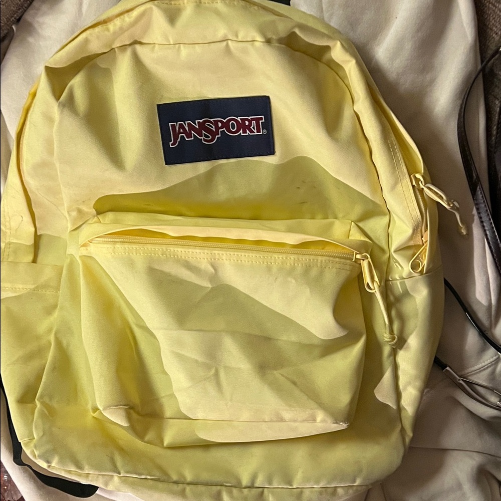 JanSport Classic Yellow Backpack three pockets